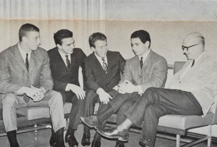 An old newspaper image shows a group of students planning the first convocation