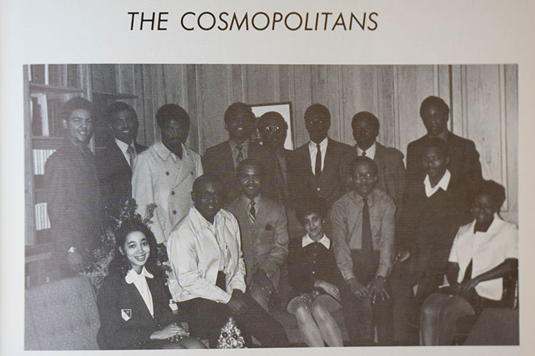 A student group called the Cosmopolitans poses for their yearbook photo.