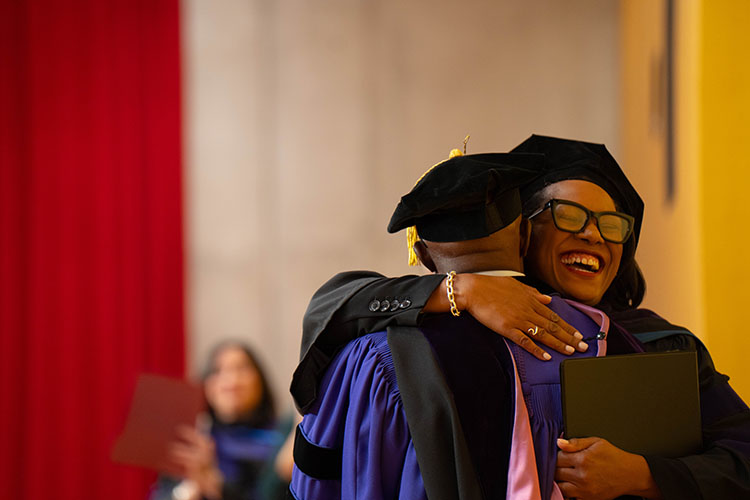 LaVonda Reed, the first female dean of the law school's history, celebrates during her first law school convocation.