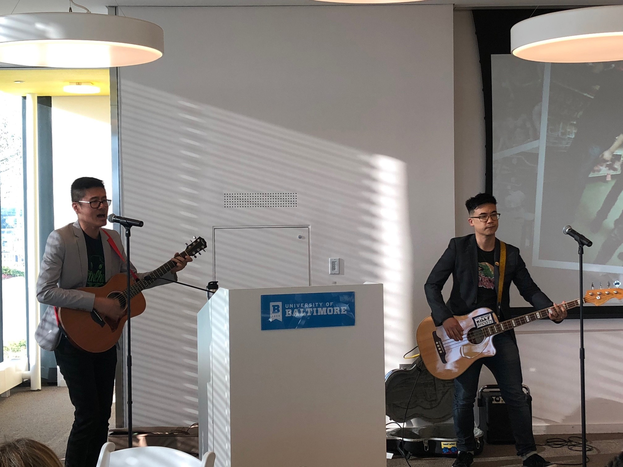 Simon Tam performing at UBalt Law