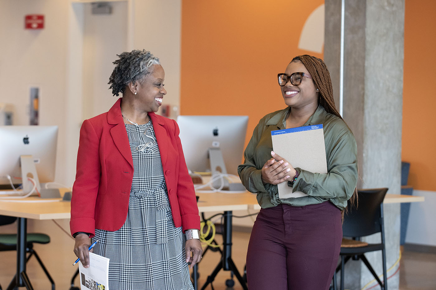 mentor and mentee laughing 