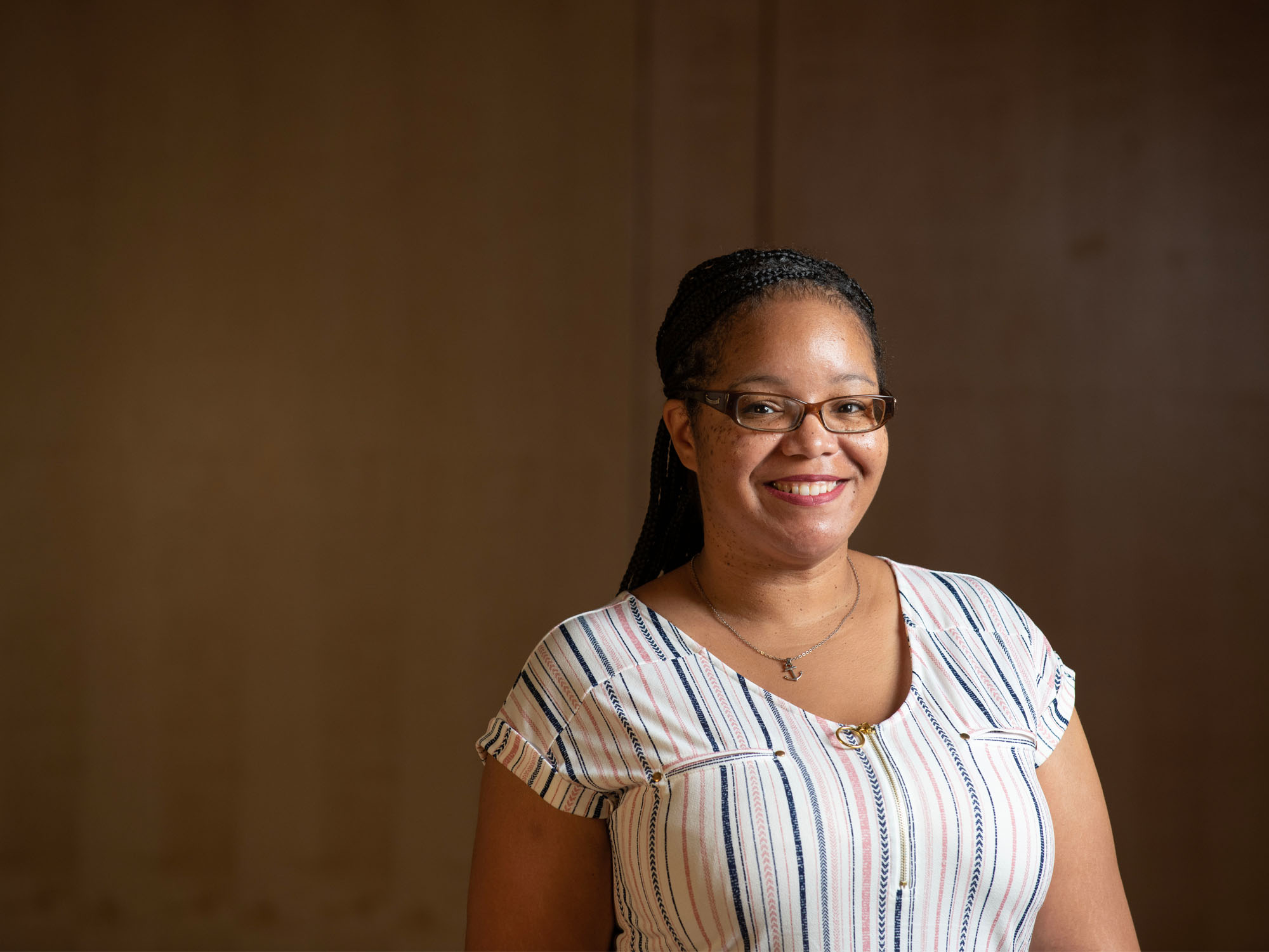 Nikki Yeboah, a UBalt alum and student, smiles at the camera. 